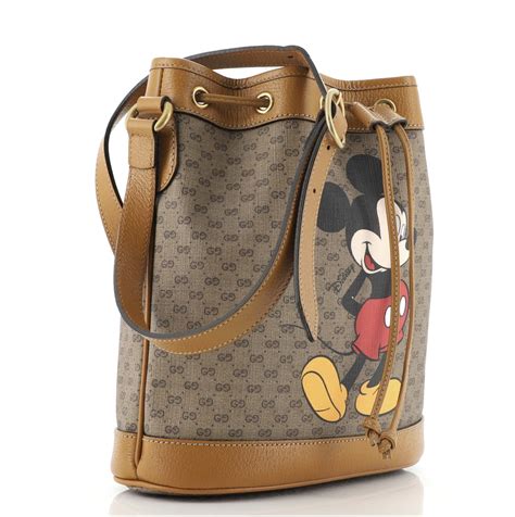 gucci disney luggage|Gucci mickey mouse bucket bag.